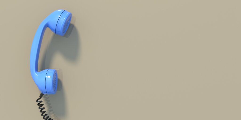 Retro telephone, blue old phone handset on beige wall background, copy space. 3d illustration